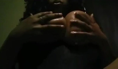 Compilation of sensual black ladies teasing by fondling their massive round tits