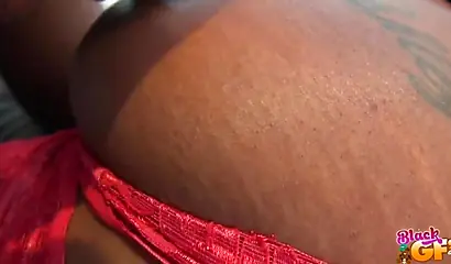 Stunning black babe in a sexy red lingerie impaled balls deep after sucking cock