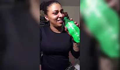 Naughty ebony teenager gives a kinky fetish performance drinking soda and burping