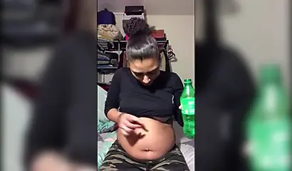 Naughty ebony teenager gives a kinky fetish performance drinking soda and burping