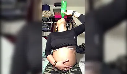 Naughty ebony teenager gives a kinky fetish performance drinking soda and burping
