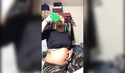 Naughty ebony teenager gives a kinky fetish performance drinking soda and burping