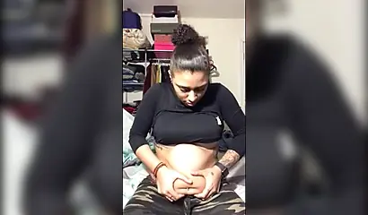 Naughty ebony teenager gives a kinky fetish performance drinking soda and burping