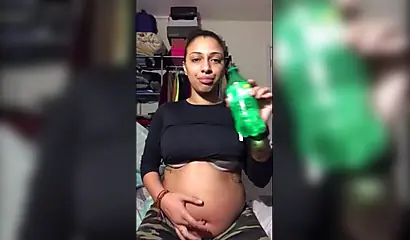 Naughty ebony teenager gives a kinky fetish performance drinking soda and burping