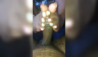 Kinky ebony chick gives a long and wet blowjob and footjob to a big black cock