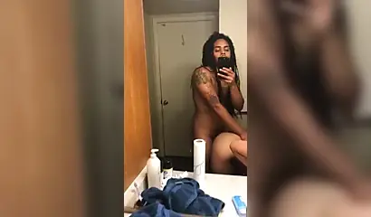 Naughty black amateur with big tits bent over and fucked long and hard doggy style