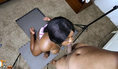 Chubby and sexy black chick gives a wet blowjob before being pounded doggy style