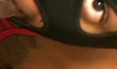 Horny and kinky masked black chick deepthroats and chokes on a massive hard dick