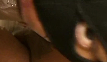 Horny and kinky masked black chick deepthroats and chokes on a massive hard dick