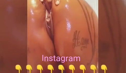 Naughty black instagram model shows off her wet snatch before fisting and dildoing