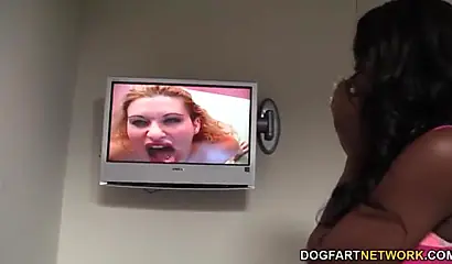 Gorgeous black chick Jezabel Vessir slobbers on a big white dick in a glory hole