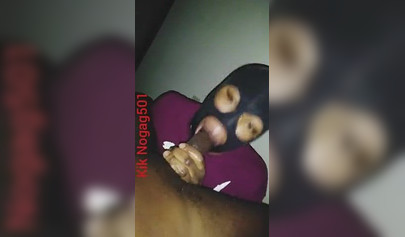 Lusty black amateur chick wears a mask and gives a long wet and sloppy blowjob