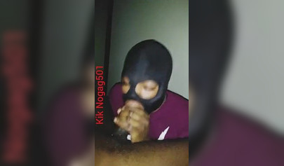 Lusty black amateur chick wears a mask and gives a long wet and sloppy blowjob