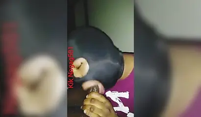 Lusty black amateur chick wears a mask and gives a long wet and sloppy blowjob
