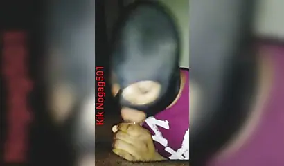 Lusty black amateur chick wears a mask and gives a long wet and sloppy blowjob