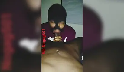 Lusty black amateur chick wears a mask and gives a long wet and sloppy blowjob