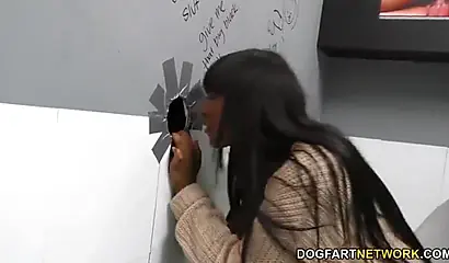 Cute ebony with huge natural tits Rachel Raxxx enjoys sucking cocks at gloryhole