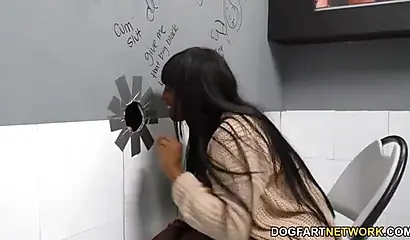 Cute ebony with huge natural tits Rachel Raxxx enjoys sucking cocks at gloryhole