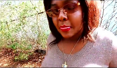 Curvy and adorable black teenie gives an outdoor blowjob and fucks doggy style