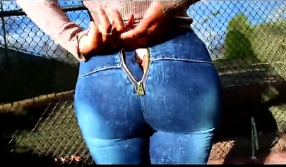 Curvy and adorable black teenie gives an outdoor blowjob and fucks doggy style