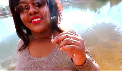 Curvy and adorable black teenie gives an outdoor blowjob and fucks doggy style