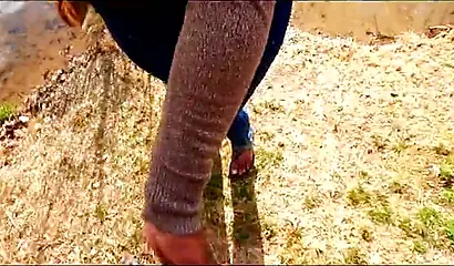 Curvy and adorable black teenie gives an outdoor blowjob and fucks doggy style