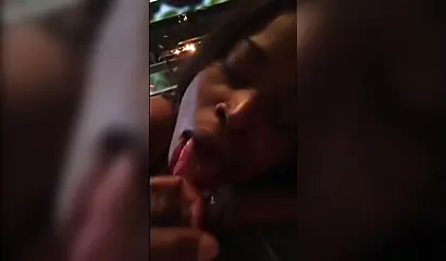 Black babe has no shame as she is filmed on camera phone while sucking a dick