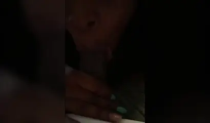 Black babe has no shame as she is filmed on camera phone while sucking a dick