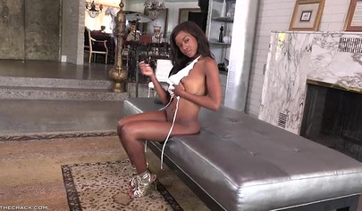 Gorgeous black teenager fucks her pussy with a toy and screams as she squirts