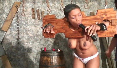 Submissive ebony amateur with short hair has her pussy punished in the dungeon