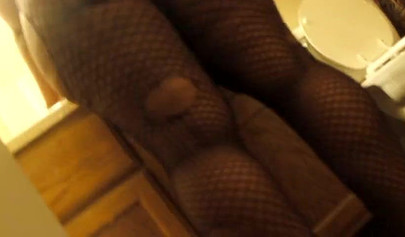 Black amateur in fishnets gives a fantastic blowjob before her pussy is drilled