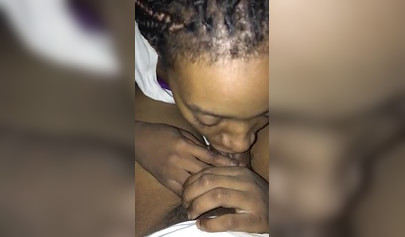 Horny black amateur babe gives a long and sloppy blowjob to a massive fat schlong