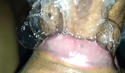 Horny black amateur babe gives a long and sloppy blowjob to a massive fat schlong