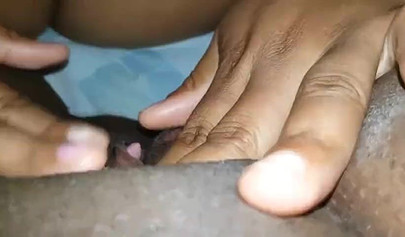 Luscious black lesbian chick enjoys giving a sensual licking to another ebony