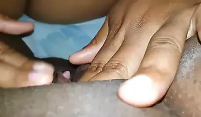 Luscious black lesbian chick enjoys giving a sensual licking to another ebony