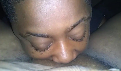 Kinky thick black chick enjoys receiving a long and sloppy oral by a horny ebony