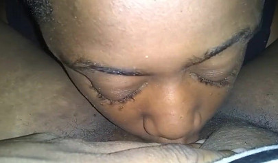 Kinky thick black chick enjoys receiving a long and sloppy oral by a horny ebony