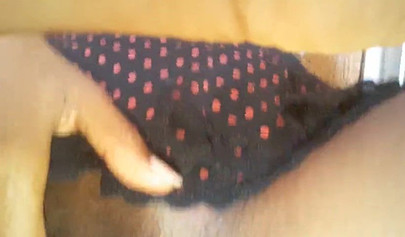 Dashing ebony babe enjoys her milkshake before fingering her wet cunt on webcam