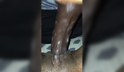 Kinky and naughty black chick gives a long and dirty handjob to a big black cock