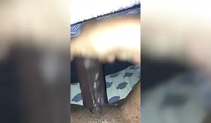 Kinky and naughty black chick gives a long and dirty handjob to a big black cock