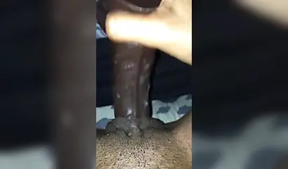 Kinky and naughty black chick gives a long and dirty handjob to a big black cock