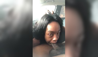 Horny ebony amateur chick gives a long and sloppy blowjob to a big cock in a car