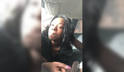 Horny ebony amateur chick gives a long and sloppy blowjob to a big cock in a car