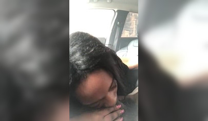 Horny ebony amateur chick gives a long and sloppy blowjob to a big cock in a car