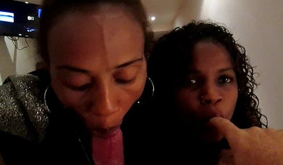 Two beautiful ebony babes give an erotic double blowjob before being fucked hard