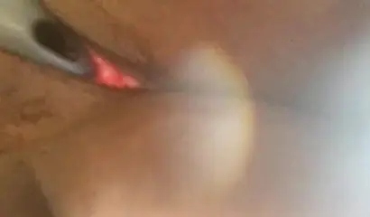 Amateur black babe with big curves records a close up video while fucking her cunt