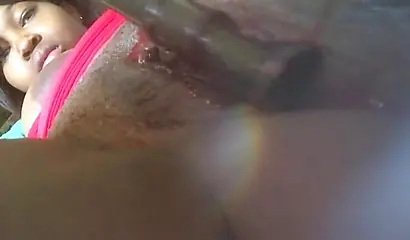 Amateur black babe with big curves records a close up video while fucking her cunt