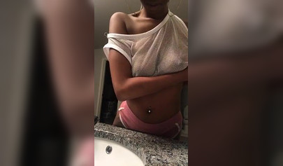 Dashing black teenie strips naked for the camera and shows off her perfect body