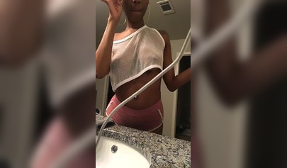Dashing black teenie strips naked for the camera and shows off her perfect body