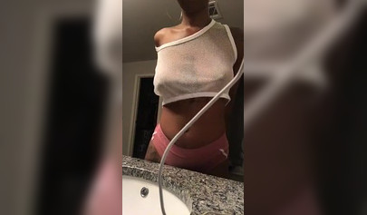 Dashing black teenie strips naked for the camera and shows off her perfect body